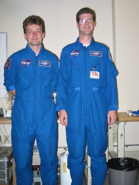 Holger and Armin in flightsuits.